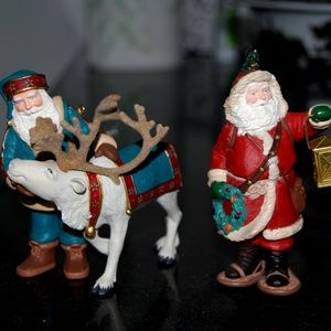 Two Hallmark Santa Ornaments
